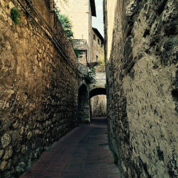 Narrow path between old buildings